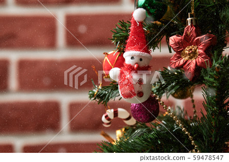 Christmas tree with ornament decorating items such as colorful ball, red flower and snowman Christmas tree with ornament decorating items such as colorful ball, red flower and snowman 59478547