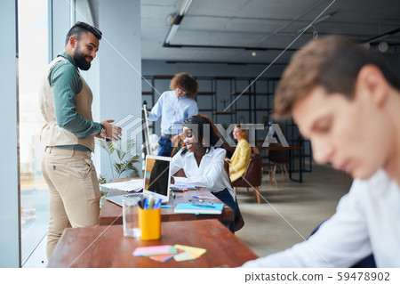 Meeting of co-workers and planning next steps of work in business office 59478902