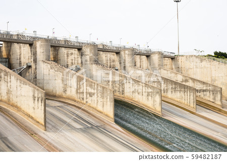 Dam with less water due to drought. Dam with less water due to drought. 59482187