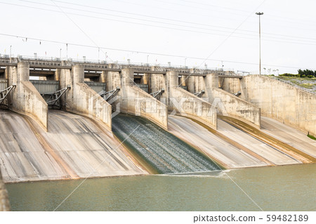 Dam with less water due to drought. Dam with less water due to drought. 59482189