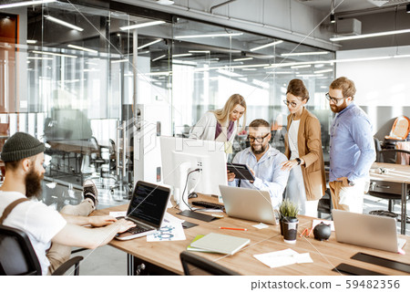 Office work with diverse coworkers Office work with diverse coworkers 59482356