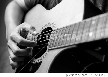Musicians are playing acoustic guitar. Musicians are playing acoustic guitar. 59484442
