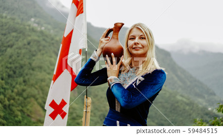 Young beautiful blonde in national georgian clothes 59484515