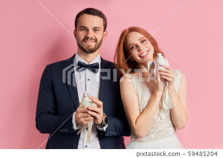 Lovely man and woman after marriage solemn ceremony 59485204