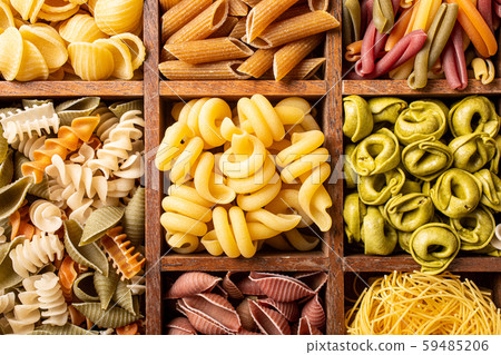 Assorted colorful italian pasta in wooden box 59485206