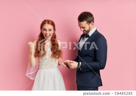 Cheerful happy woman with auburn hair happy to get married 59485285