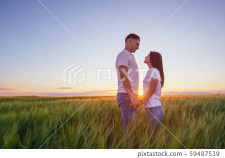 Love Couple in  romantic summer field 59487519