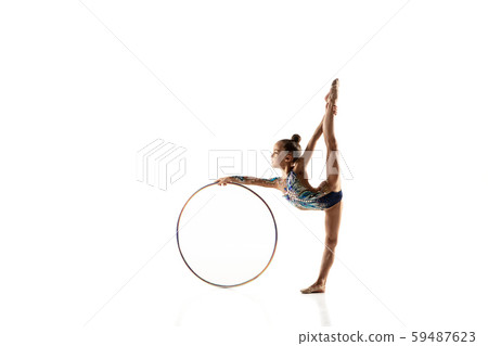 Little flexible female gymnast isolated on white studio background Little flexible female gymnast isolated on white studio background 59487623