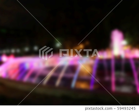 motion blurred in different shades of colors. 59493245