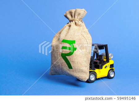 Forklift carries a huge money bag with the symbol of the Indian rupee. Budget and corruption, investment and economic growth. capital migration. Superprofits. Win a tender and get a contract 59495146