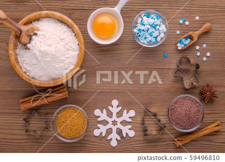 ingredients and kitchen tools for dessert baking on wooden background 59496810