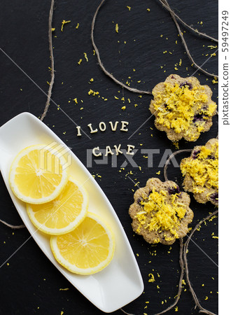 lemon cupcakes on a black background 59497249