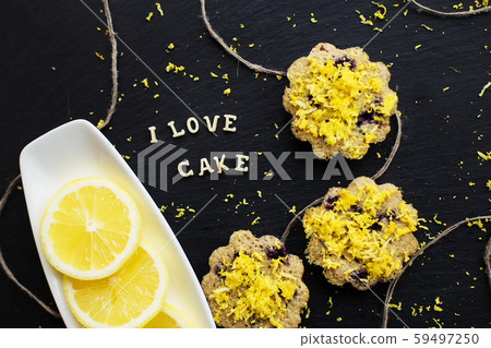 lemon cupcakes on a black background 59497250