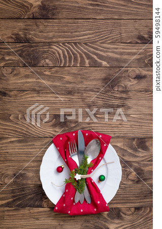 Christmas table place setting with red and white Christmas table place setting with red and white 59498144