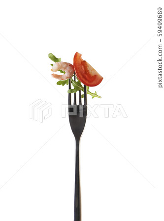 salad on fork isolated on white background 59499689