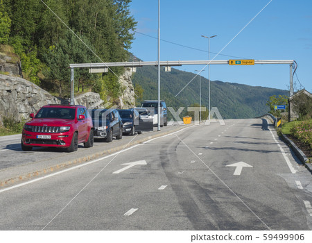 Fjaerland, Norway, September 8, 2019: Cars waiting for Ferry boat over Sognefjord from Sogndal Fjaerland, Norway, September 8, 2019: Cars waiting for Ferry boat over Sognefjord from Sogndal 59499906