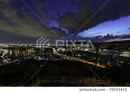 Evening view from Ichida City's Mayuyama stand, Hanshin Expressway Ikeda Line and Shininagawa Ohashi (Big Harp) 59503410