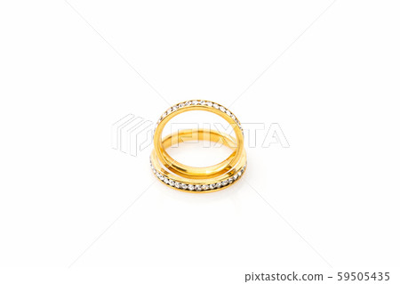 Gold wedding rings on white background 59505435