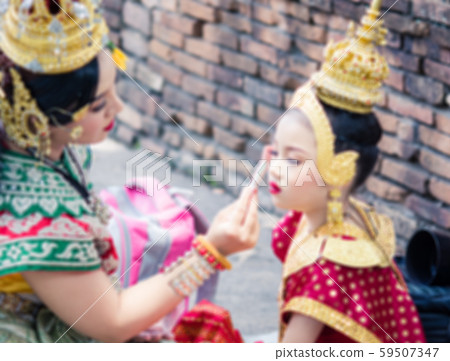 Asian woman wearing typical, traditional Thai 59507347