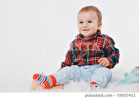 portrait of a happy child on a white background. concept of childhood, healthcare, IVF 59507451