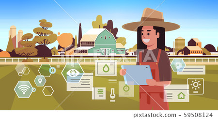woman farmer with tablet monitoring condition controlling agricultural products organization of 59508124