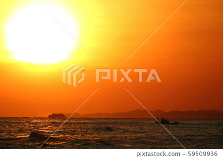 The setting sun and a ship The setting sun and a ship 59509936