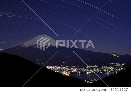 Mount Fuji night view and star trail from Misaka Pass in Yamanashi 59511397