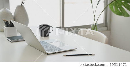 Comfortable office room with laptop computer and 59511471