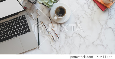 Top view of trendy workspace with laptop computer Top view of trendy workspace with laptop computer 59511472