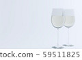 2 glasses with white wine 59511825