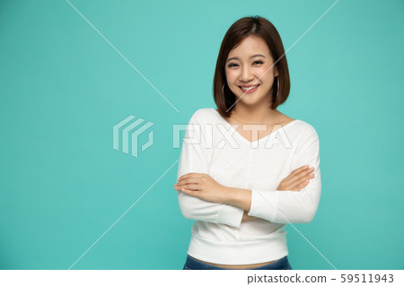 Portrait of successful Asian woman with arms Portrait of successful Asian woman with arms 59511943