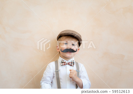 Happy child playing in home 59512613