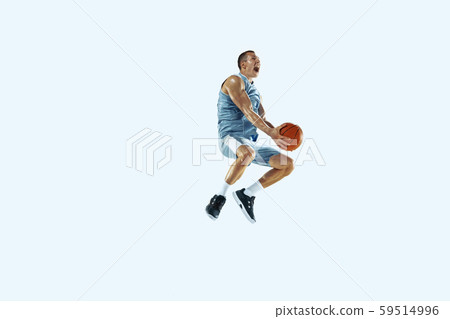 Young caucasian basketball player against white studio background 59514996
