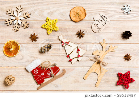 Top view of Christmas toys on wooden background. Top view of Christmas toys on wooden background. 59518487