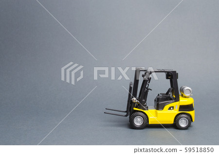 Yellow forklift truck side view on gray background. Warehouse equipment, vehicle. Unloading, transportation, sorting, loading cargo. Logistics and transport infrastructure, industry and agriculture Yellow forklift truck side view on gray background. Warehouse equipment, vehicle. Unloading, transportation, sorting, loading cargo. Logistics and transport infrastructure, industry and agriculture 59518850