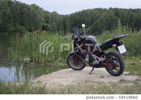 hyper moto in a dirty field. 59519660