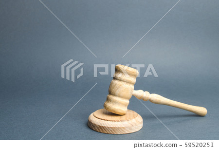 Judge's hammer on a gray background. The judicial system. Norms, rules and laws. Conflict resolution in court. Court case, settling disputes. Protection of their rights and freedoms, honor and dignity Judge's hammer on a gray background. The judicial system. Norms, rules and laws. Conflict resolution in court. Court case, settling disputes. Protection of their rights and freedoms, honor and dignity 59520251