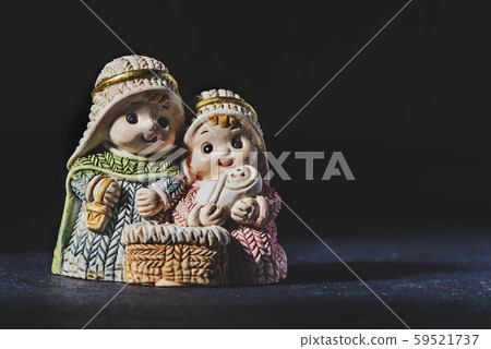 the holy family on a dark gray surface 59521737