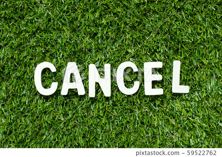Alphabet letter in word cancel on artificial green grass 59522762