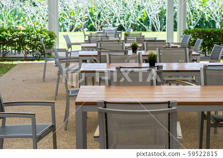 wooden and metal tables and chairs with garden. wooden and metal tables and chairs with garden. 59522815