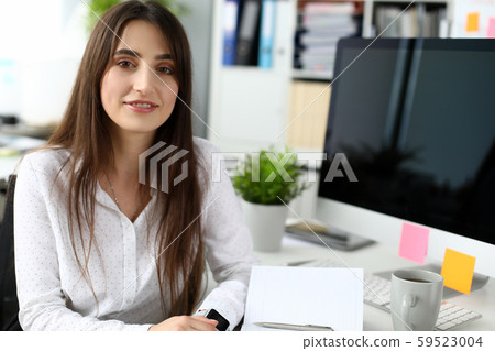 Pretty designer in modern office Pretty designer in modern office 59523004