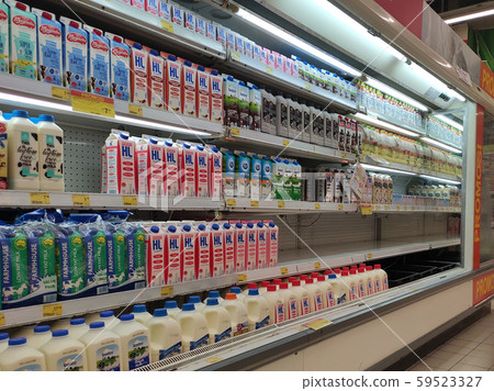 Selected focused on the dairy product such as milk, yogurt and prebiotic drinks displayed on cool chiller rack in the supermarkets.  59523327