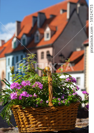 Basket with flowers in the center of Riga 59524755