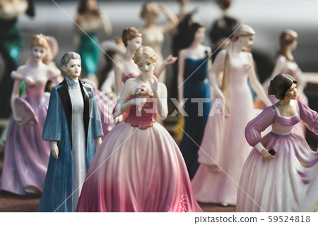 Porcelain figurines at the fair. Porcelain figurines at the fair. 59524818