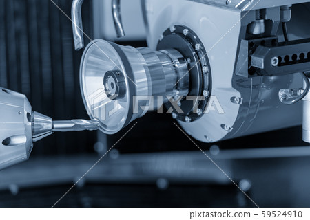 The operation of cutting tool making machine. 59524910