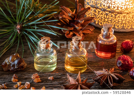Christmas mix of essential oils with frankincense, myrrh, star anise, pine and dried rose hips 59528846