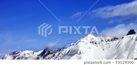 Snow mountain at sunny winter day Snow mountain at sunny winter day 59529300