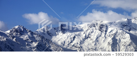 Snowy mountains and glacier at sunny day Snowy mountains and glacier at sunny day 59529303