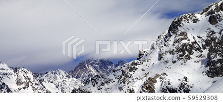 Snow rocks in clouds Snow rocks in clouds 59529308