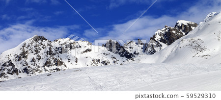 Ski slope at sun winter day Ski slope at sun winter day 59529310